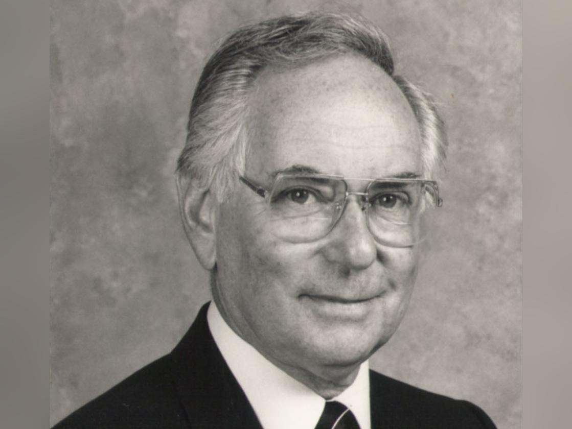 Middle-aged man in black-and-white portrait photo