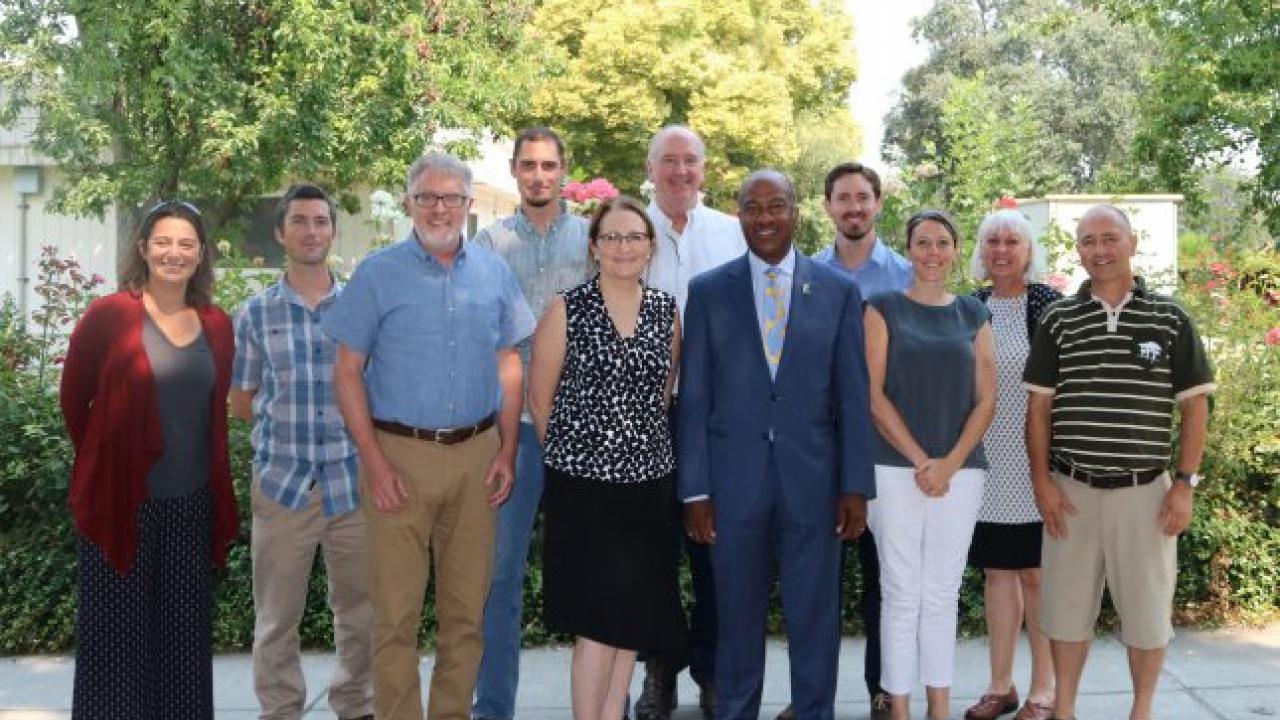 Meeting at UC Davis Plant Sciences were (from left): Valerie Eviner, Pat J. Brown, Charlie Brummer, Jeff Ross-Ibarra, Dept. Chair Gail Taylor, John Palmer, Chancellor Gary May, Brian Bailey, Amelie Gaudin, Associate Dean Mary Delany, and Allen Van Deynze. (photo: Ann Filmer/UC Davis)