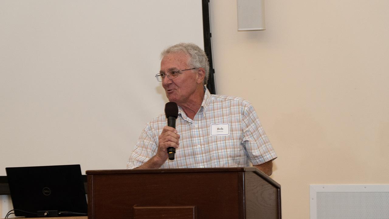 A man speaking at a podium